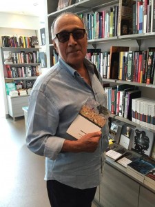 Kiarostami with AK book